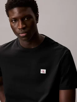 miesten t-paita K SS Badge Tee,><noscript><img width=