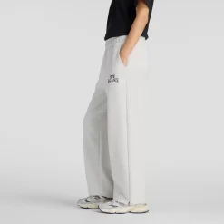 naisten collegehousut Linear Heritage Fleece Barrel Pant, vaaleanharmaa>New Balance Best