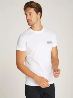 miesten t-paita, PRINTED BADGE TEE>Tommy Hilfiger Online